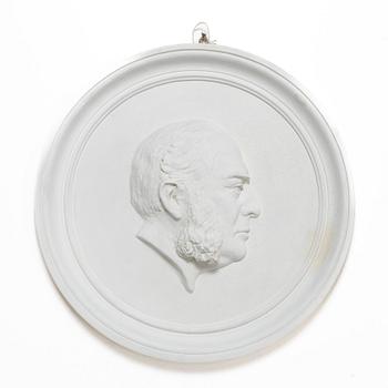 Medaljong, porträtt av Erik Gabriel Poppius, omkring år 1900.