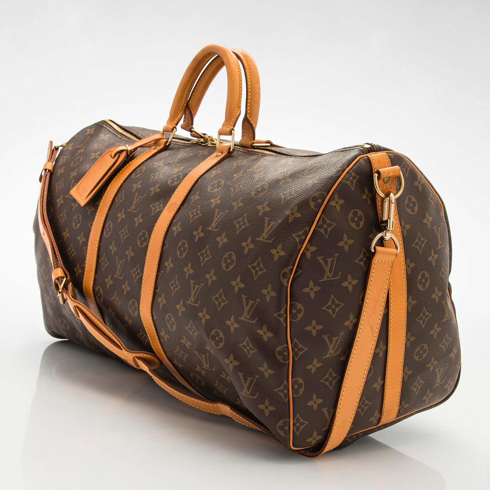 Louis Vuitton, a Monogram Canvas 'Keepall 55 Bandoulière' weekend bag.