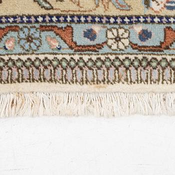 A Tabriz type carpet, c. 300 x 200 cm.