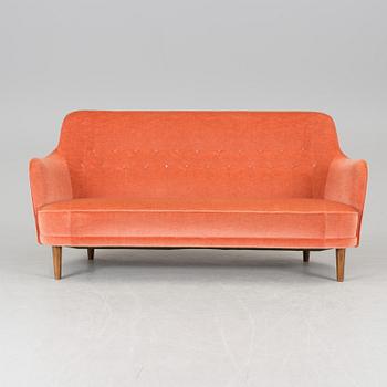 a "Samsas" sofa designed by Carl Malmsten.