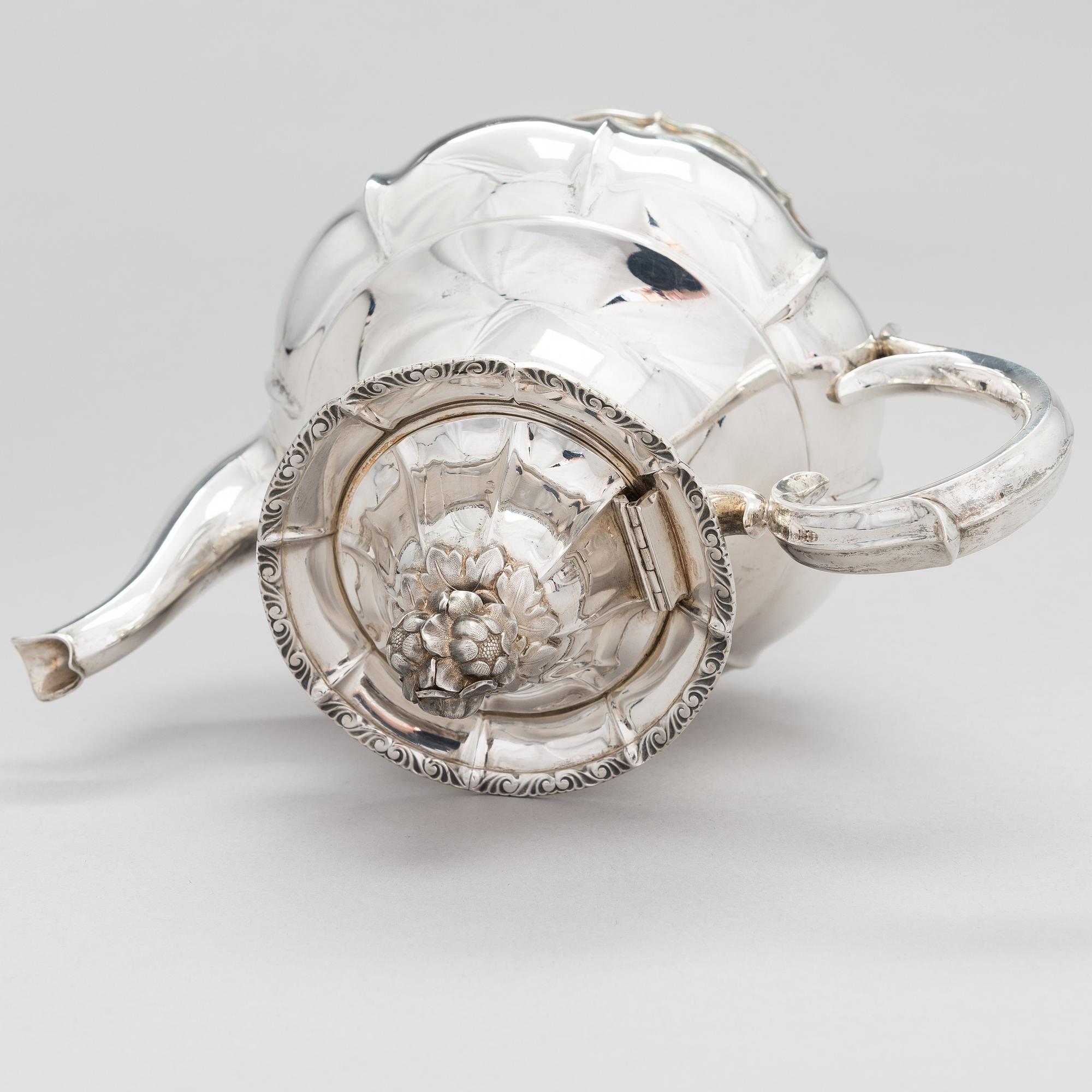 A silver coffee pot, a parcel-gilt sugar bowl and cream jug, Turku Finland 1946 and 1985.