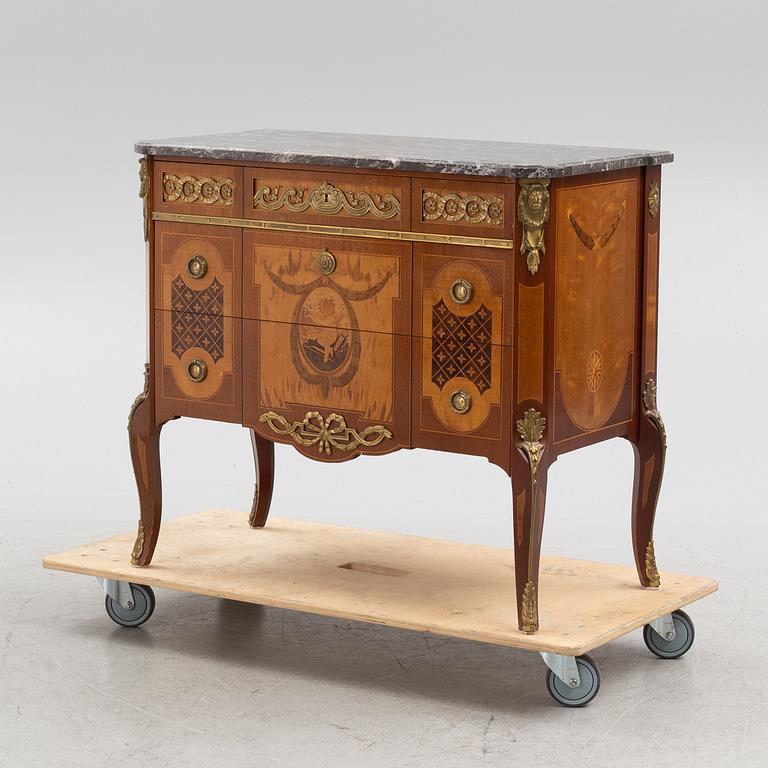 A Gustavian style chest of drawers, mid 20th Century.