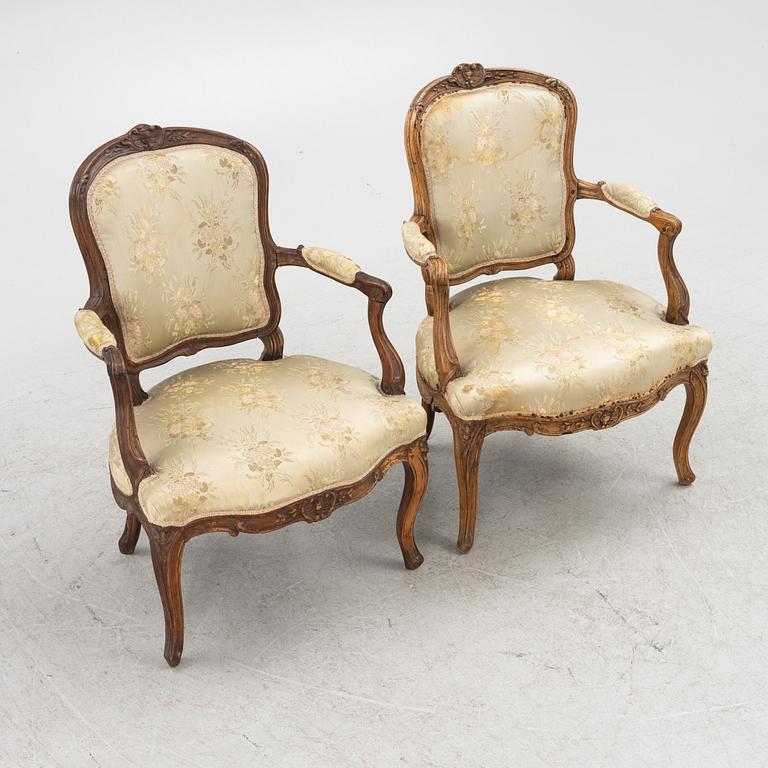 A Pair of Louis XV Beechwood Armchairs, 18th Century.