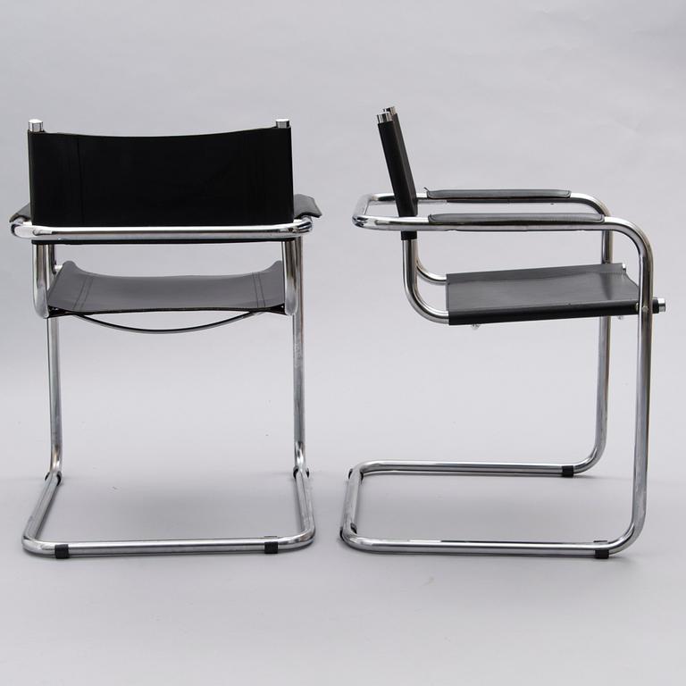 A Set of Three Chrome and Black Leather Chairs.