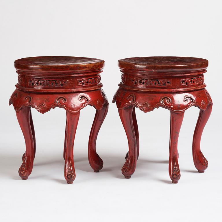 A pair of Chinese red lacquered stools/stands, early 20th century.