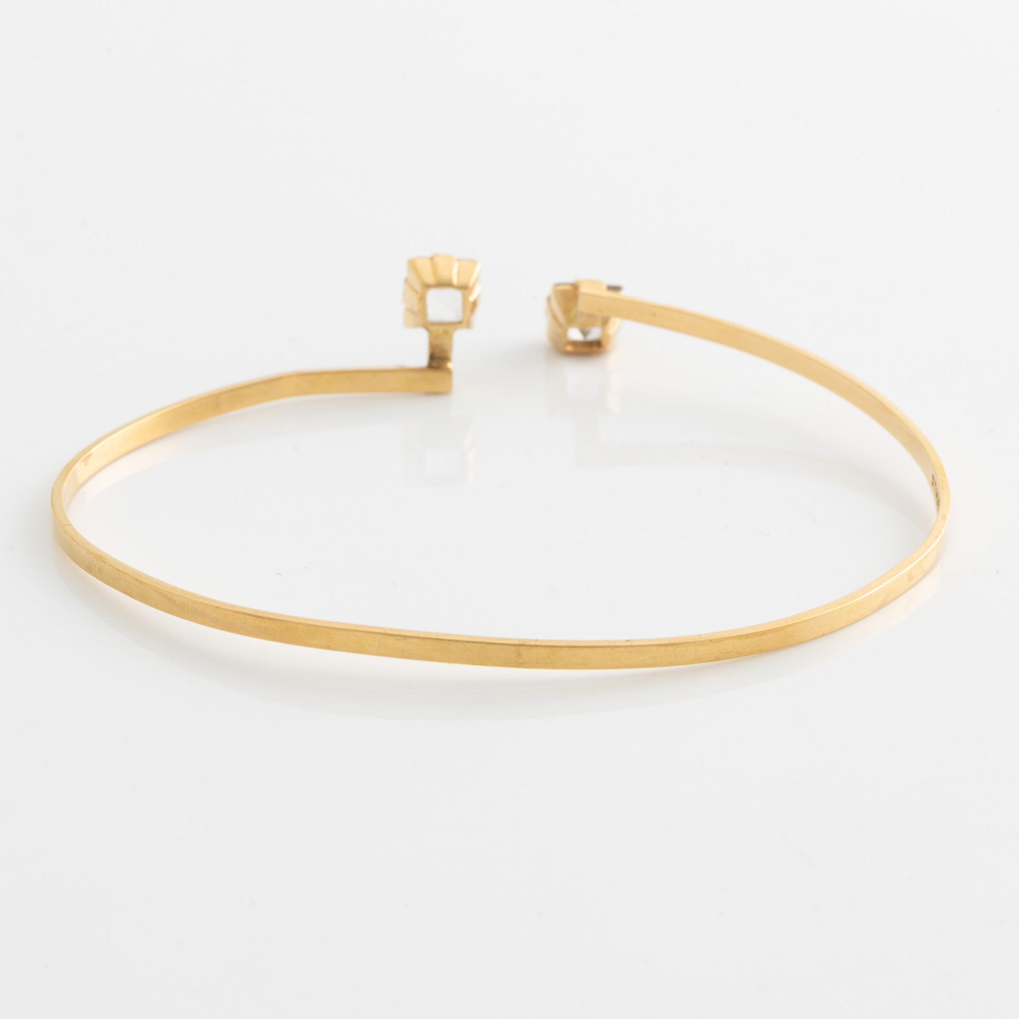 Stigbert, armring, 18K guld med bergkristall.