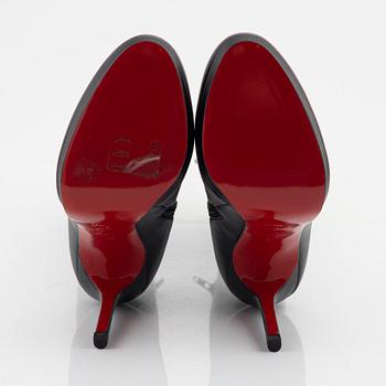 Christian Louboutin, a pair of black leather stiletto boots, size 37.