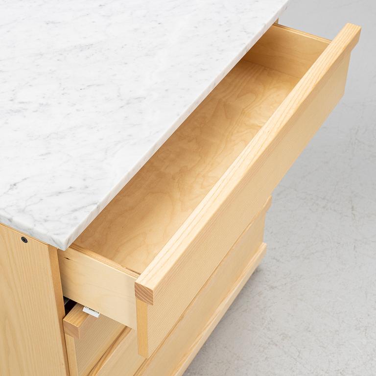 A contemporary chest of drawers.