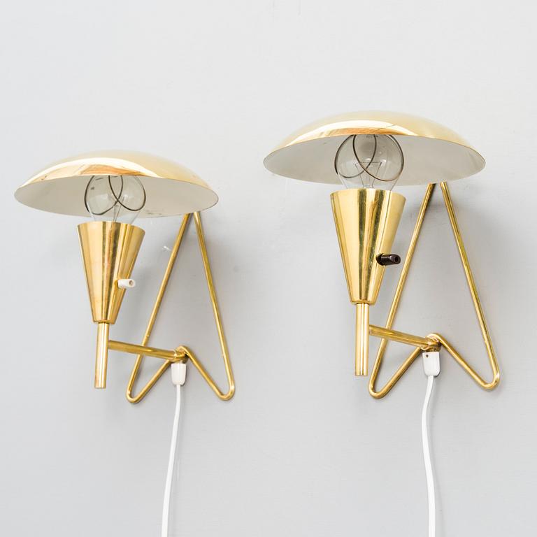 A pair of mid-20th-century wall lights / table lamps, model EV 57 for Itsu, Finland.