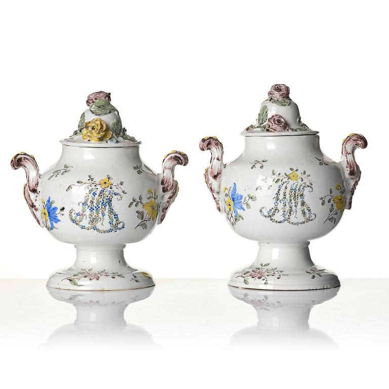 A pair of fainece potpurri jars with covers, Northern Europe, 18th century.