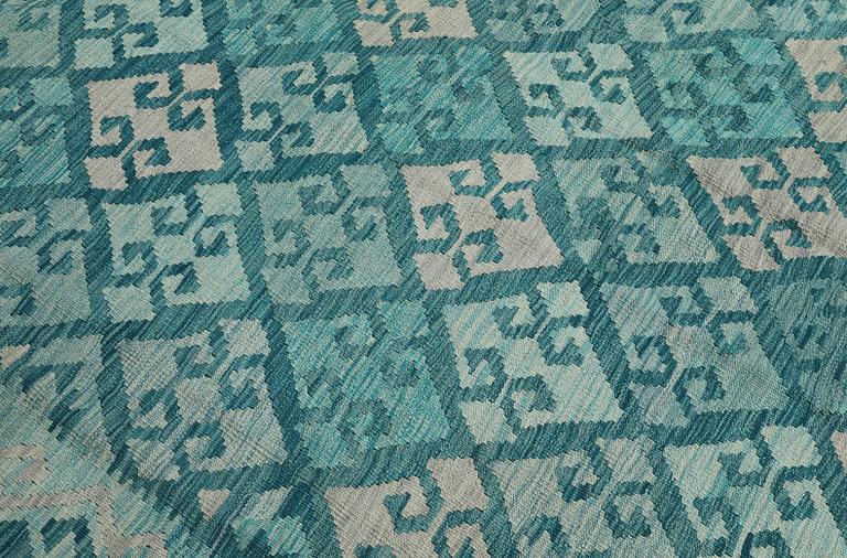 A Kelim carpet, 350 x 245 cm.
