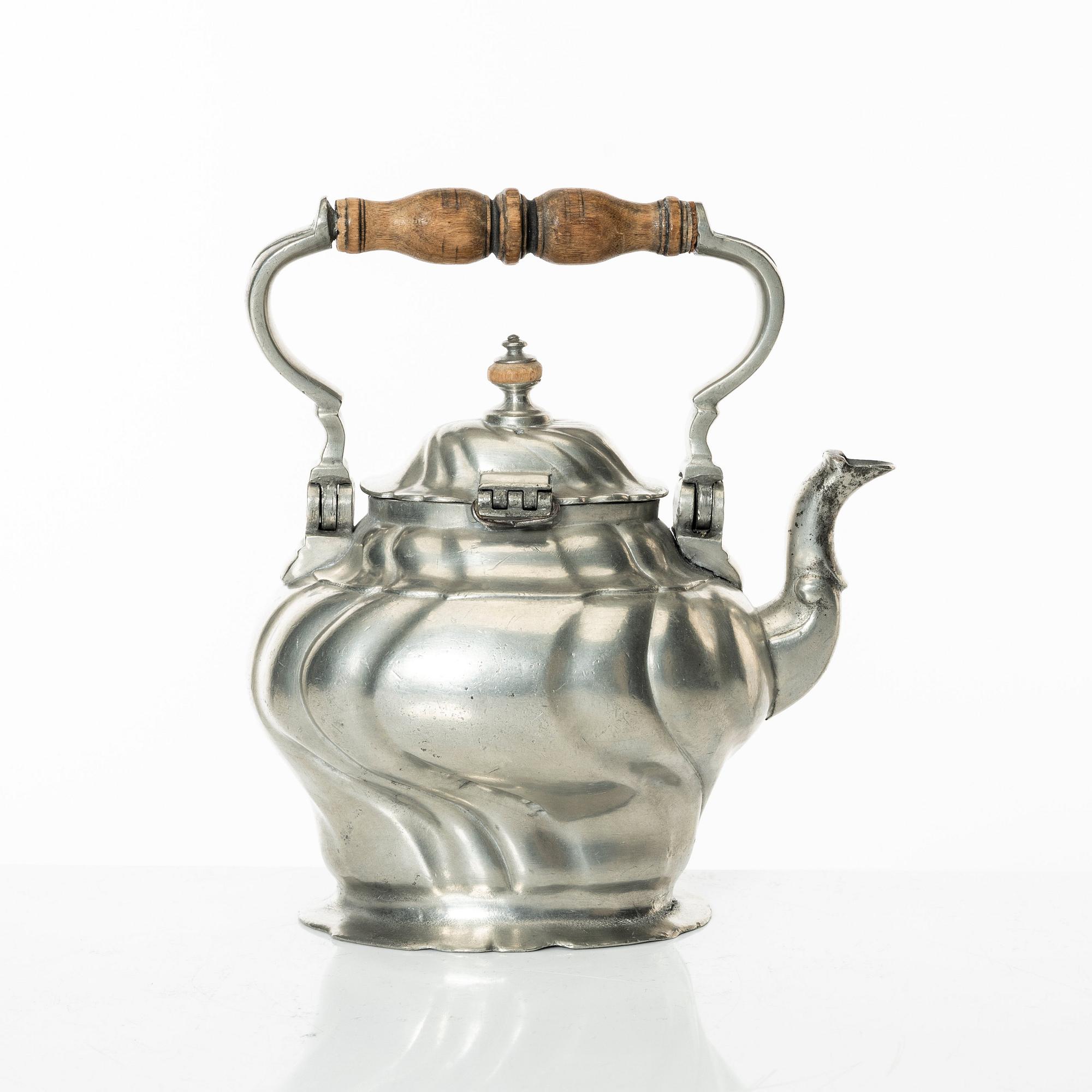 A Rococo pewter teapotby P J Mattsson 1808.