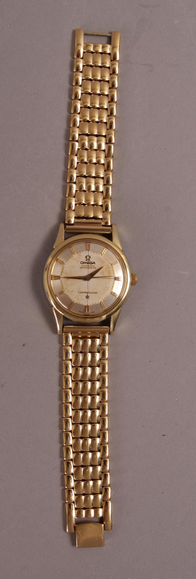ARMBANDSUR, Omega Constellation, guld på stål.
