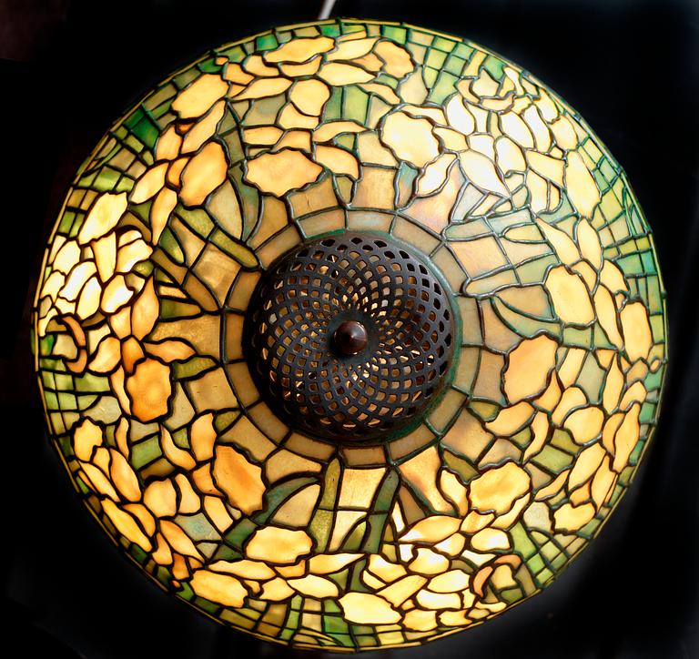 A Tiffany Studios Art Nouveau 'Daffodils' bronze base table lamp, New York circa 1910-15.