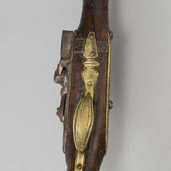 A 19th century flintlock pistol probably from the Ottoman Empire.