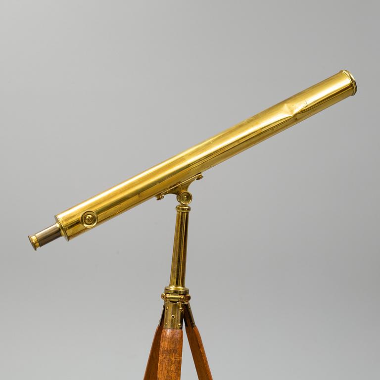 A brass telescope, circa 1900.