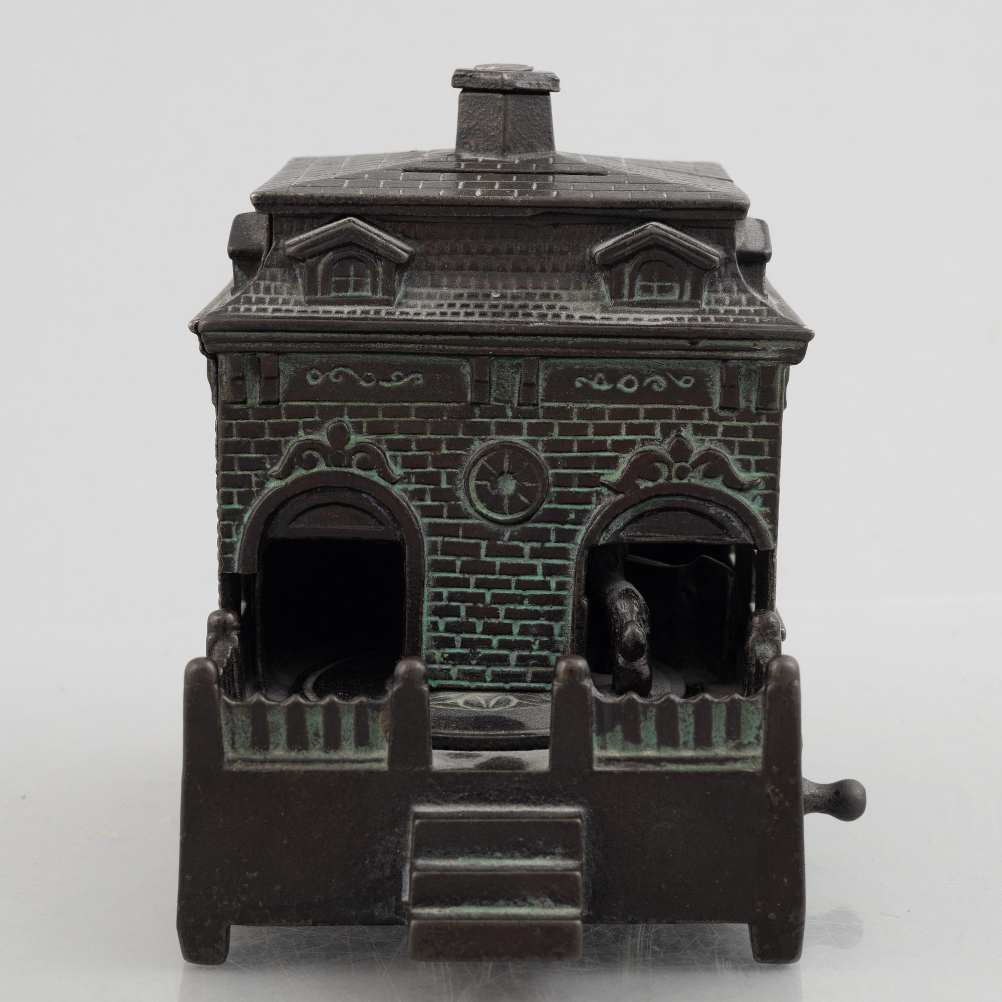 A mechanical bank, late 19th century, probably by Judd Manuf. Comp.