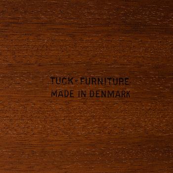 A Hans J Wegner serving trolley veneered with teak.