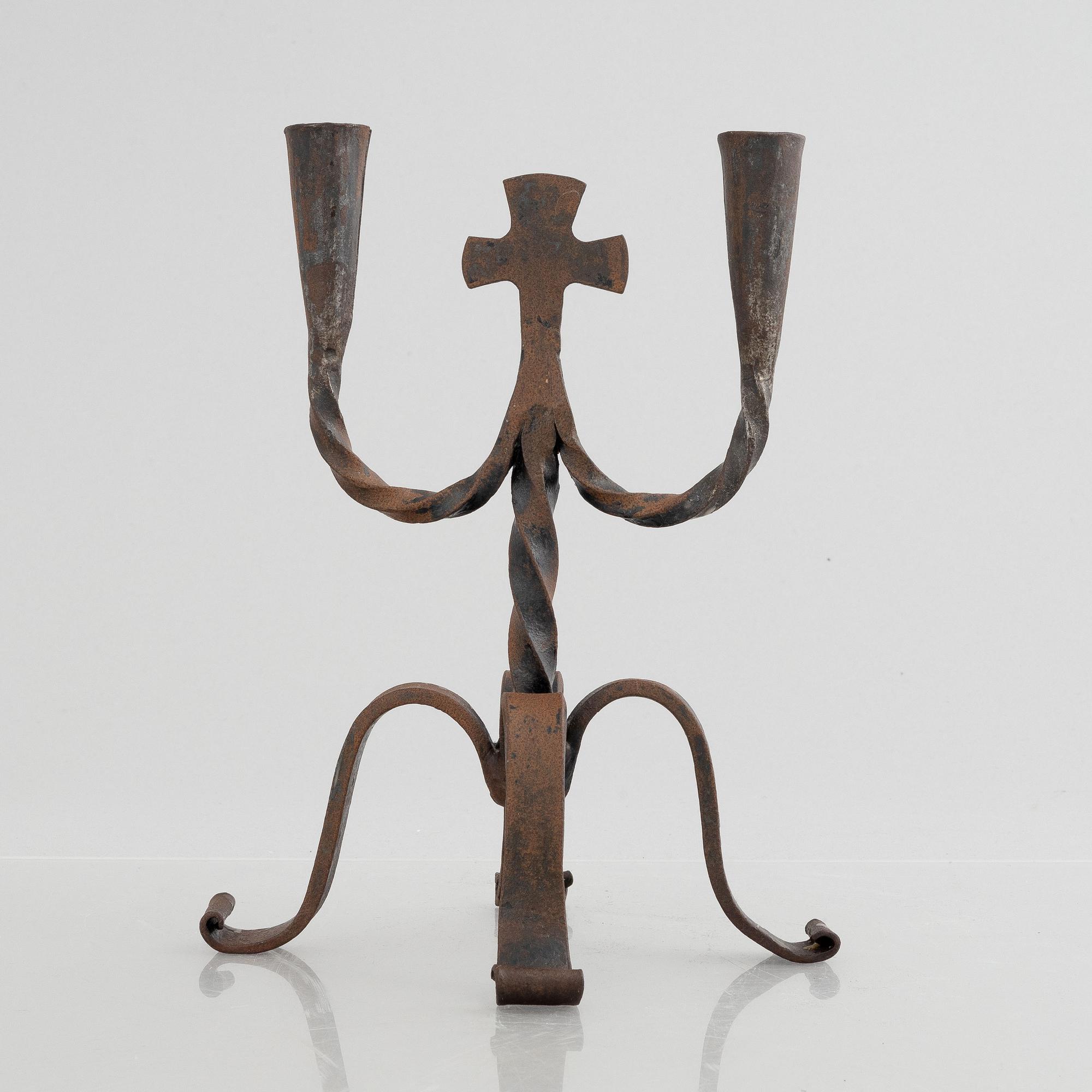 A two-light wrought-iron candlesticks, 20th century.
