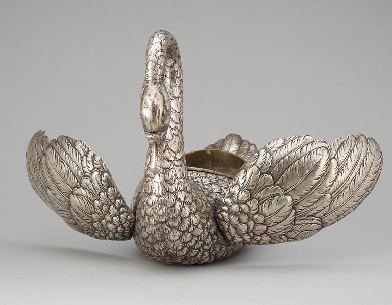 A German silver flower stand in the shape of a swan.