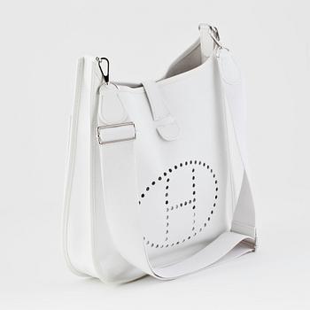 HERMÈS, a white leather shoulderbag, "Evelyn".