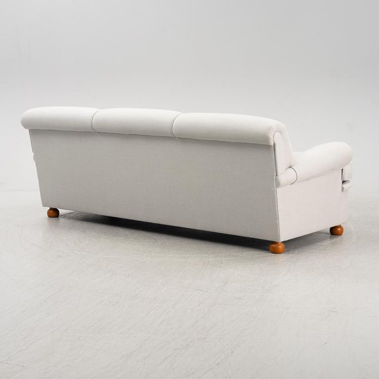 A model 703 sofa by Josef Frank for Firma Svenskt Tenn.