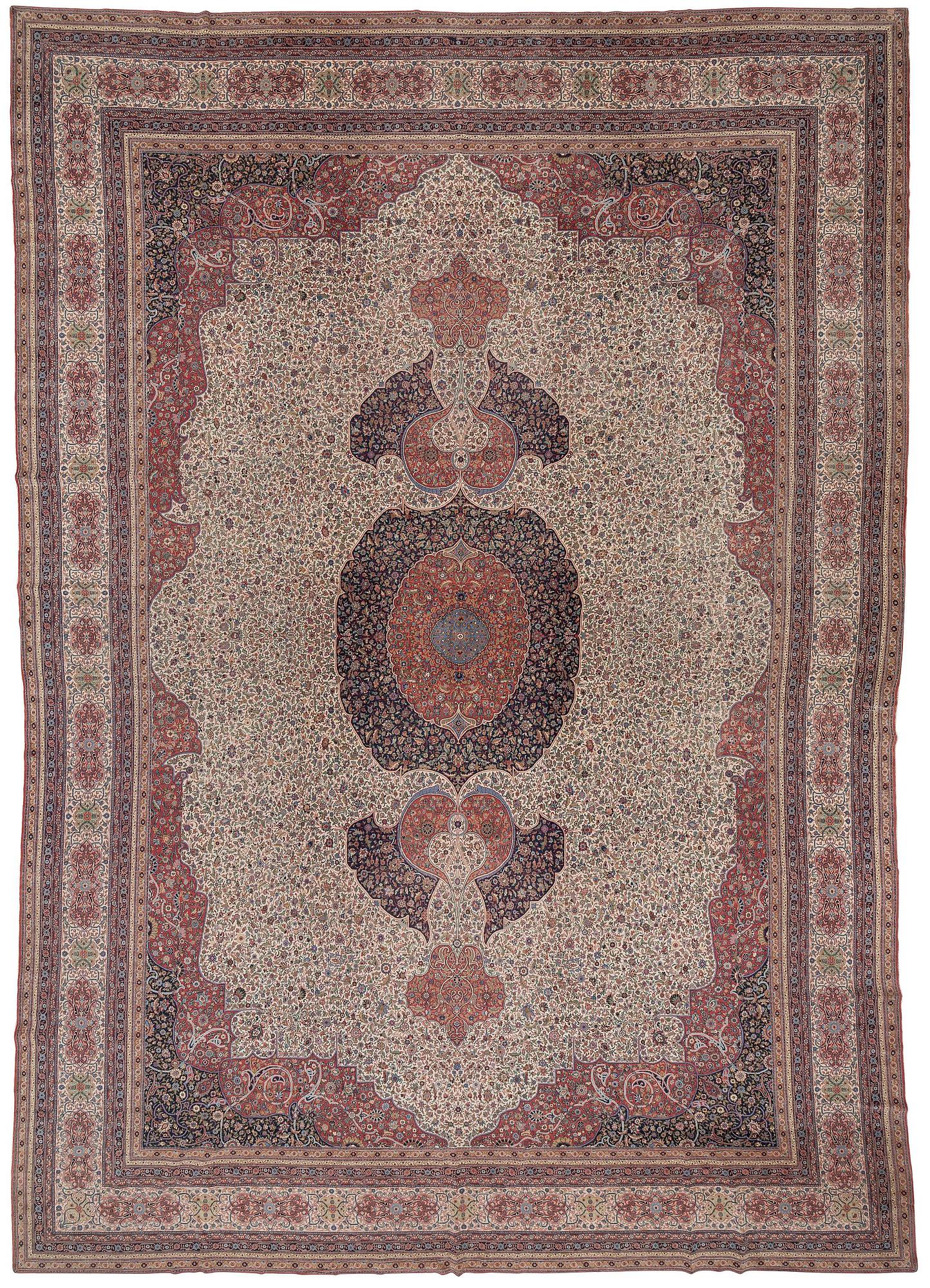 A semi-antique Hereke carpet, Western Turkey, c. 685 x 489 cm.