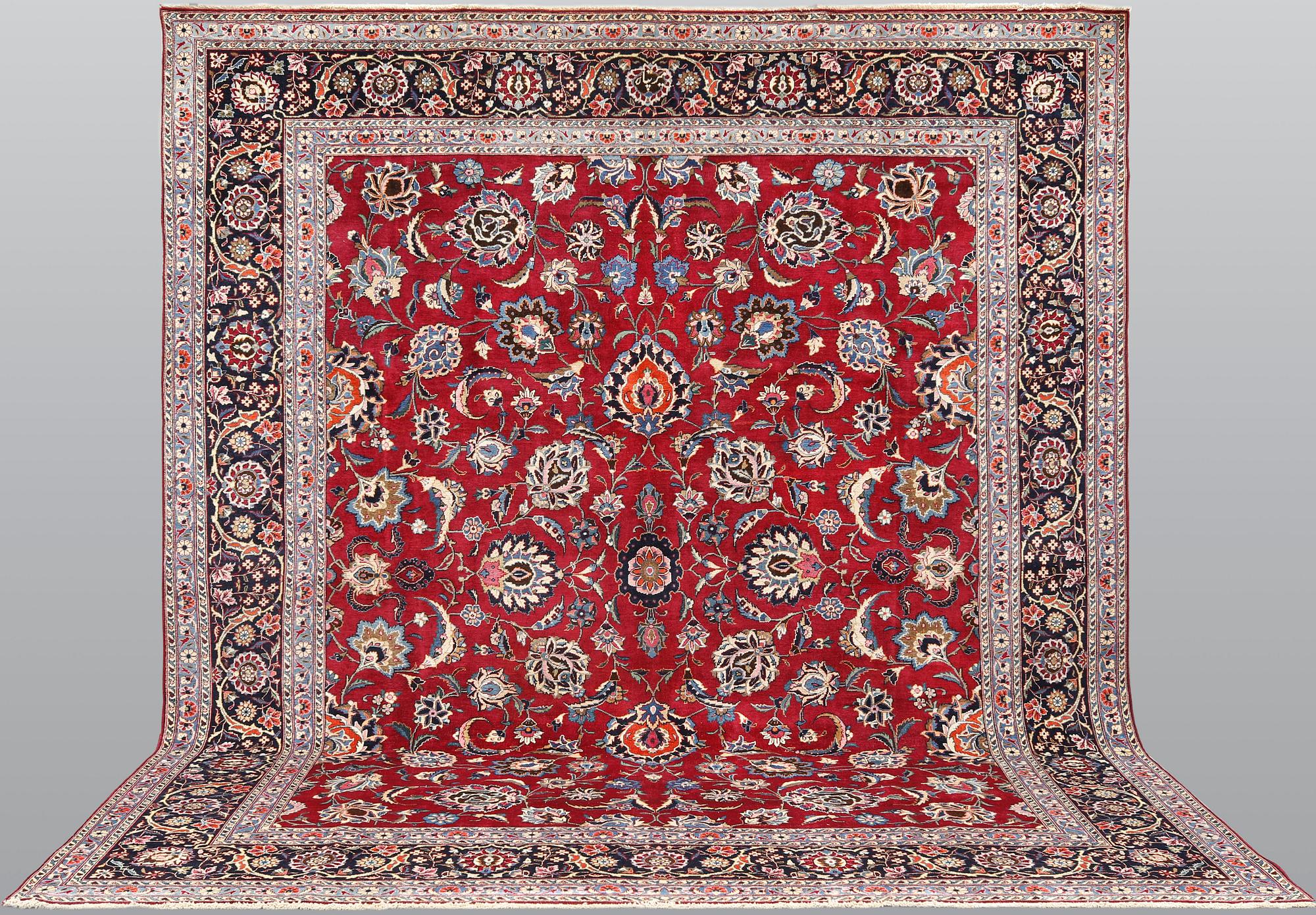 A Meshed carpet, approx. 340 x 295 cm.