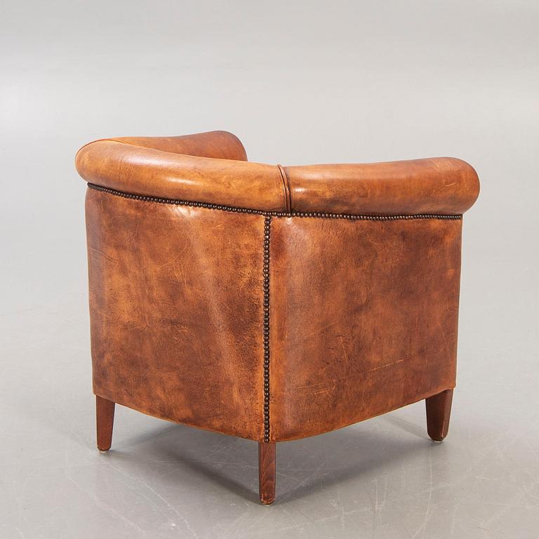 A leather easy chair later part of the 20th century.