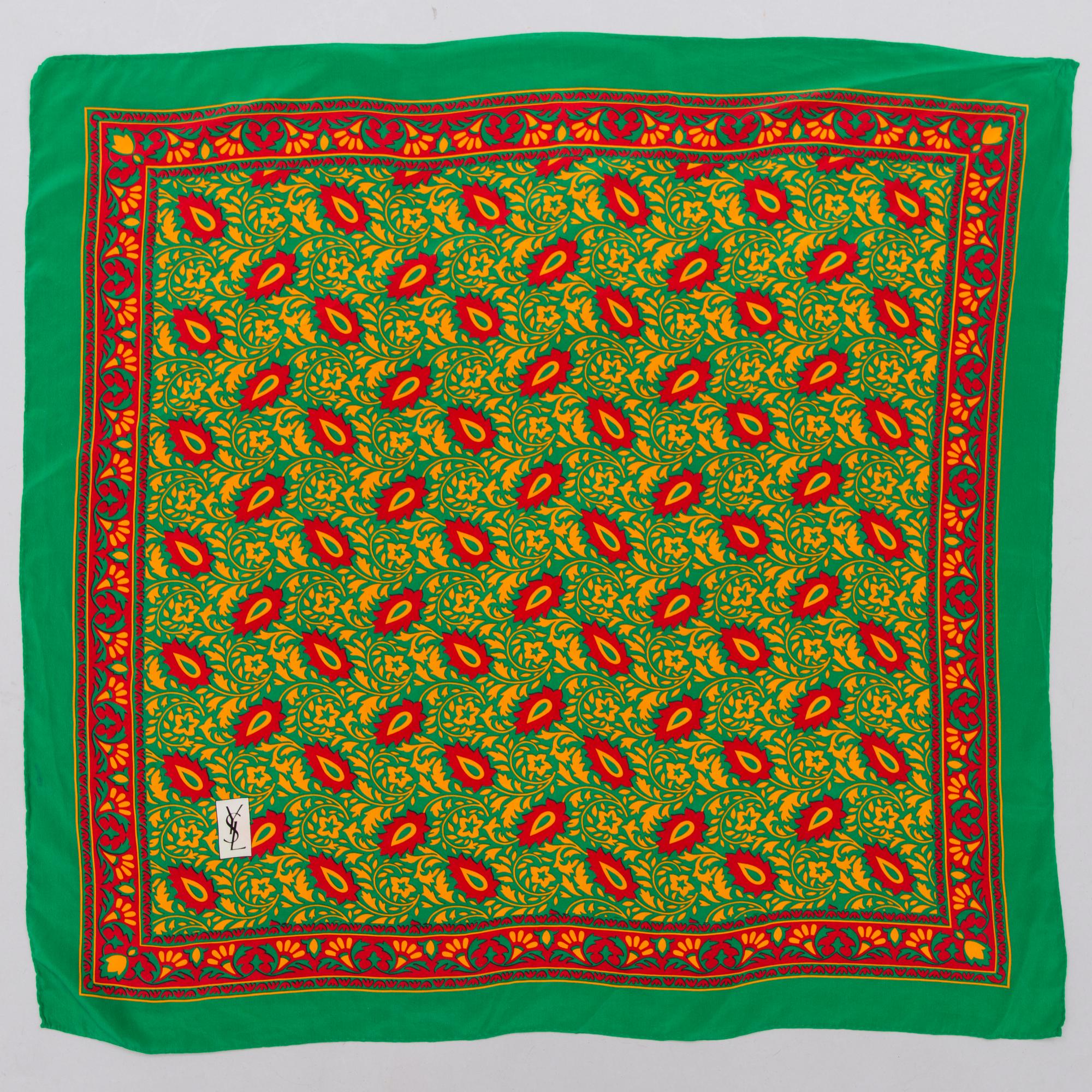 Two Silk Scarves by YSL and must de Cartier.