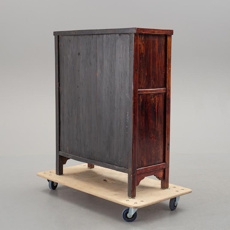 A 19th century Chinese chest of drawers/medicine cabinet.