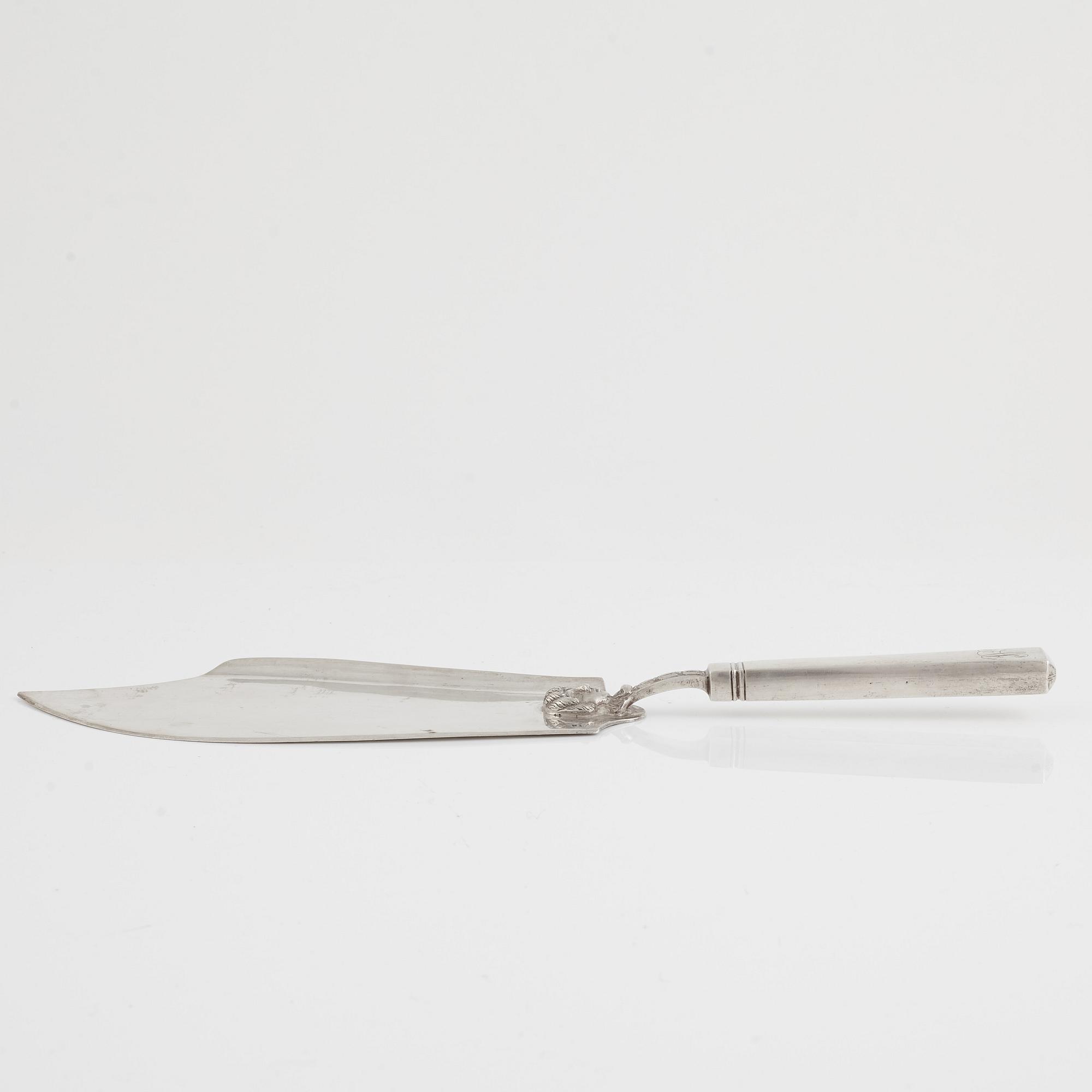 A Silver Cake Server, circa 1900.