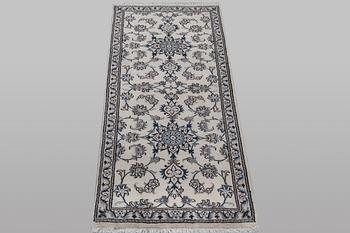 A runner carpet, Nain, part silk, ca 197 x 77 cm.