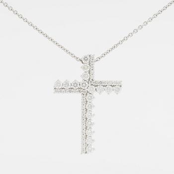 Brilliant cut diamond cross necklace.