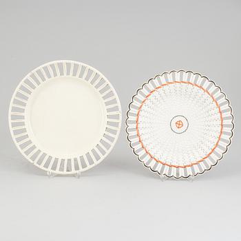 TWO CREAMWARE PLATES, one marked Wedgwood, first half of the 19th century and late 18th century.