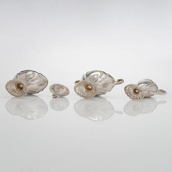 A five-piece sterling silver coffee and tea service, and 12 spoons, USA, first quarter of the 20th century.