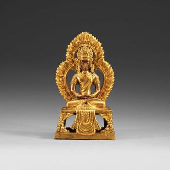 1317. A gilt bronze figure of Bodhisattva, Qing dynasty, 18th Century. With inscription to base.