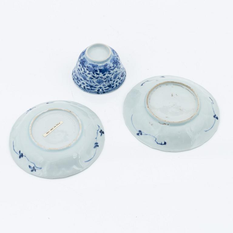 Two blue and white bowls, and a cup with two stands, Qing dynasty, 18th Century.