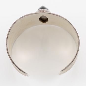 Armring, silver med kattögesten, Schweiz.