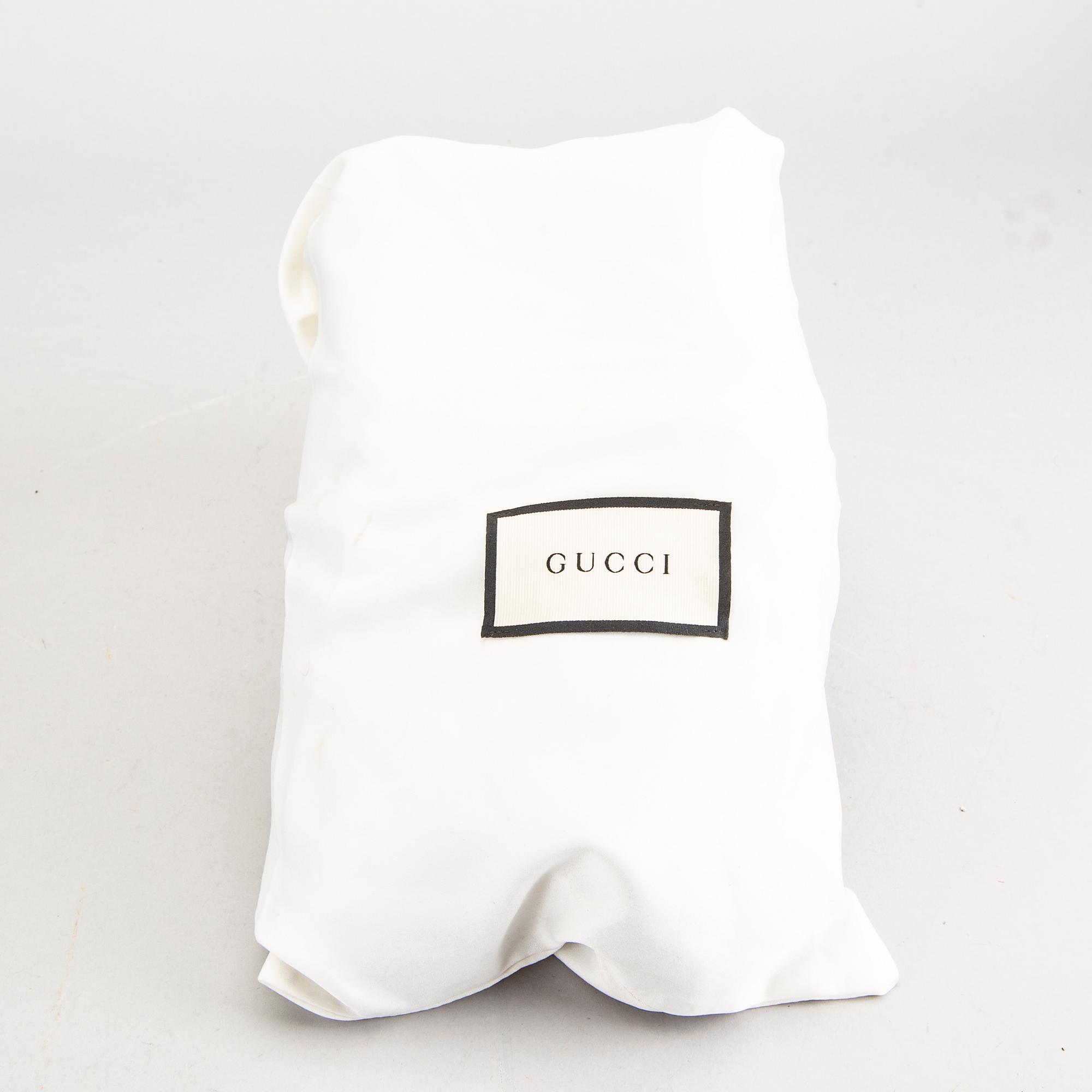 A piar of Gucci sneakers, size 37 1/2.