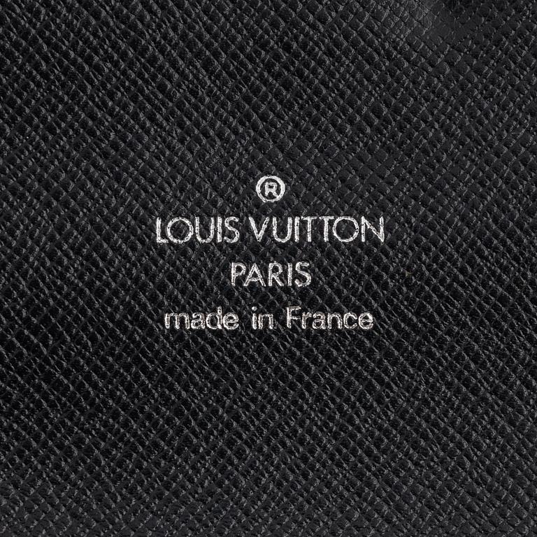 Louis Vuitton, A black taiga case.