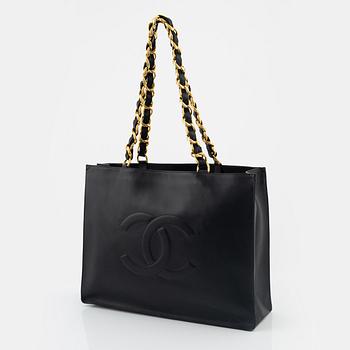Chanel, a black leather and gold tone chain 'Shopper', 1991-1994.