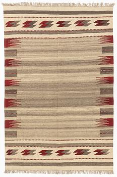 A Persian Kilim carpet, c. 288 x 195 cm.