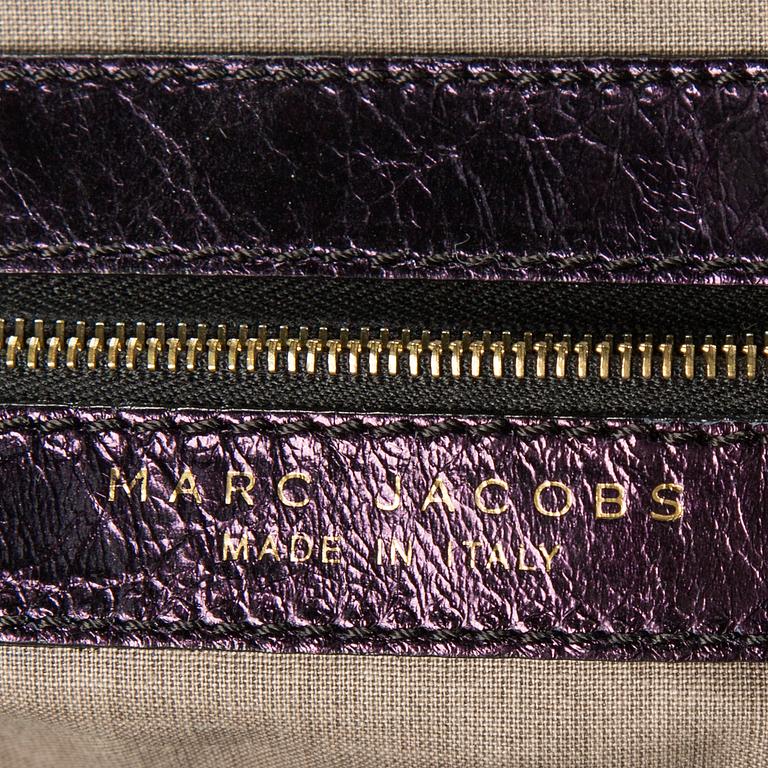 A bag by  MARC JACKOBS.