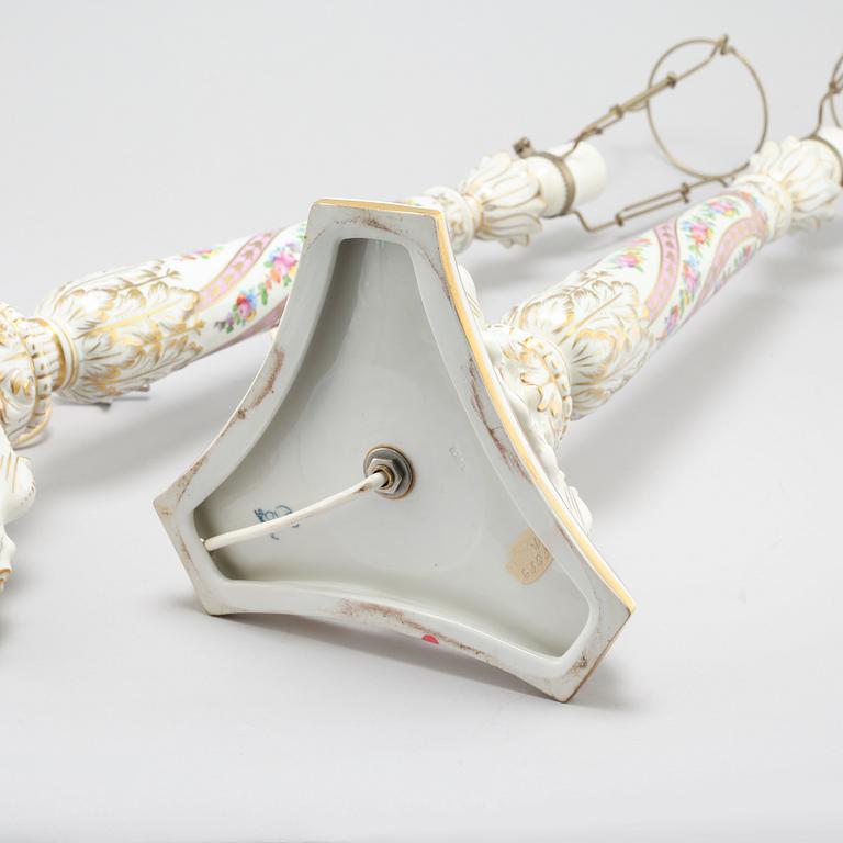 A pair of porcelain lamp feet by Dresden, made in the first half of the 20th century.