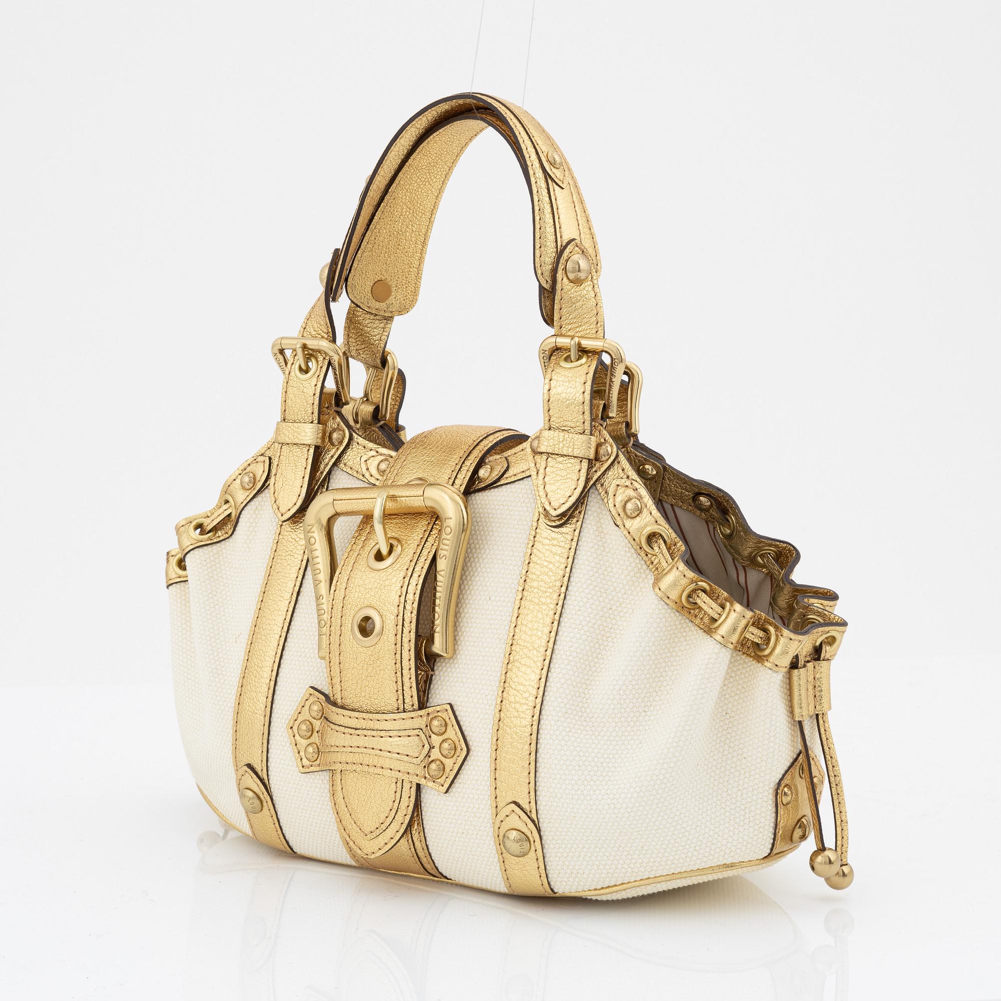 Louis Vuitton, a white canvas and gold 'Theda PM' bag, 2004.