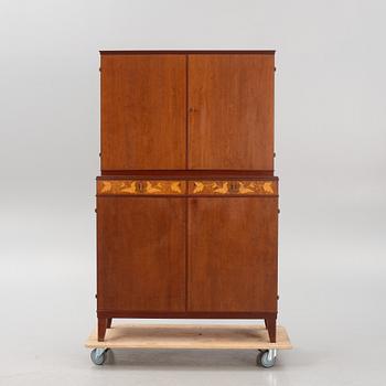 Carl Malmsten, a mahogany-veneered cabinet, AB J.O. Carlsson Möbelindustri, Vetlanda, sweden, around mid 20th century.