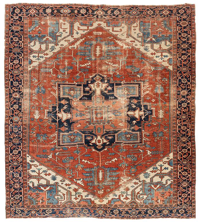 An antique Heriz carpet, ca 350 x 317 cm.