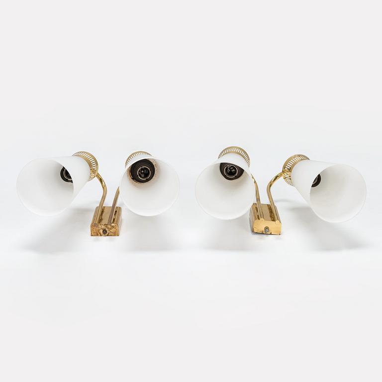 A pair of mid-20th century 'EY 60' wall lights for Itsu.