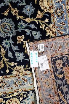 A Kashan carpet, c. 395 x 305 cm.
